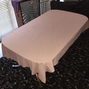 Tablecloth in Peach. Approximately 99” x 57”